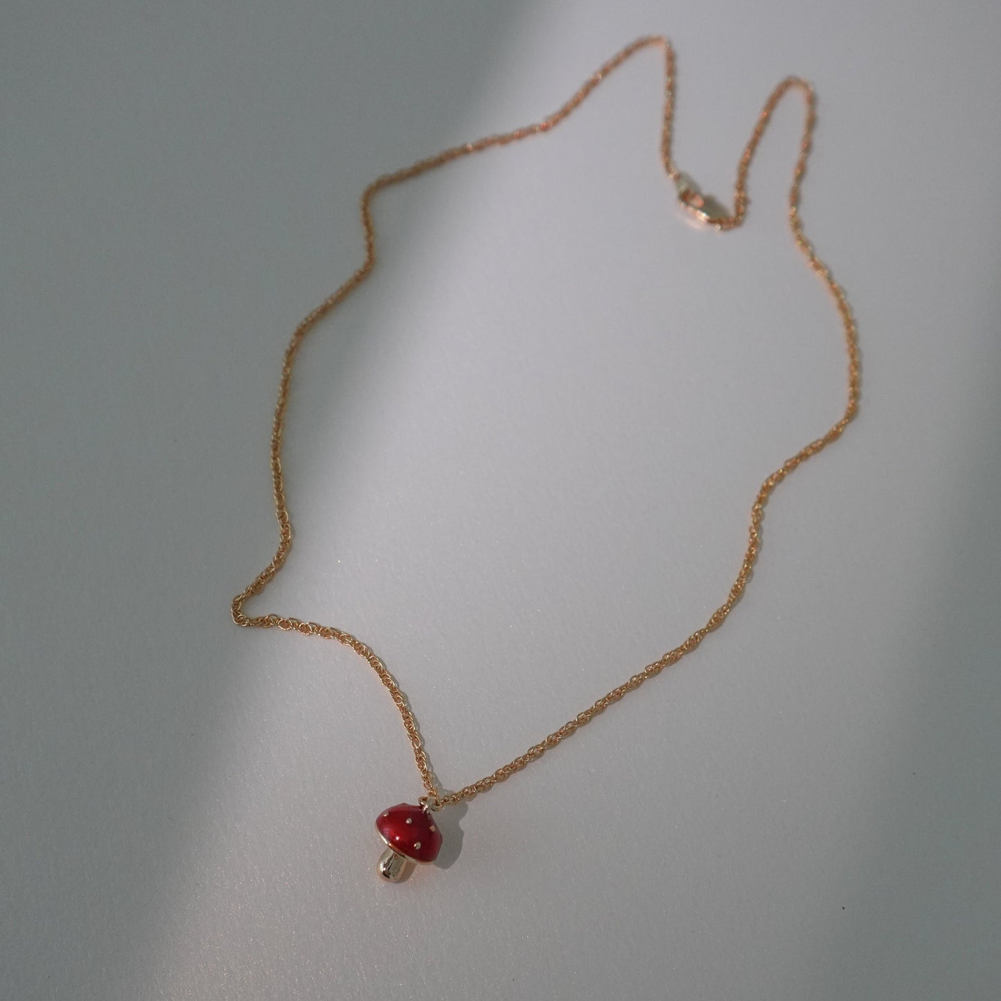 Tiny red mushroom necklace