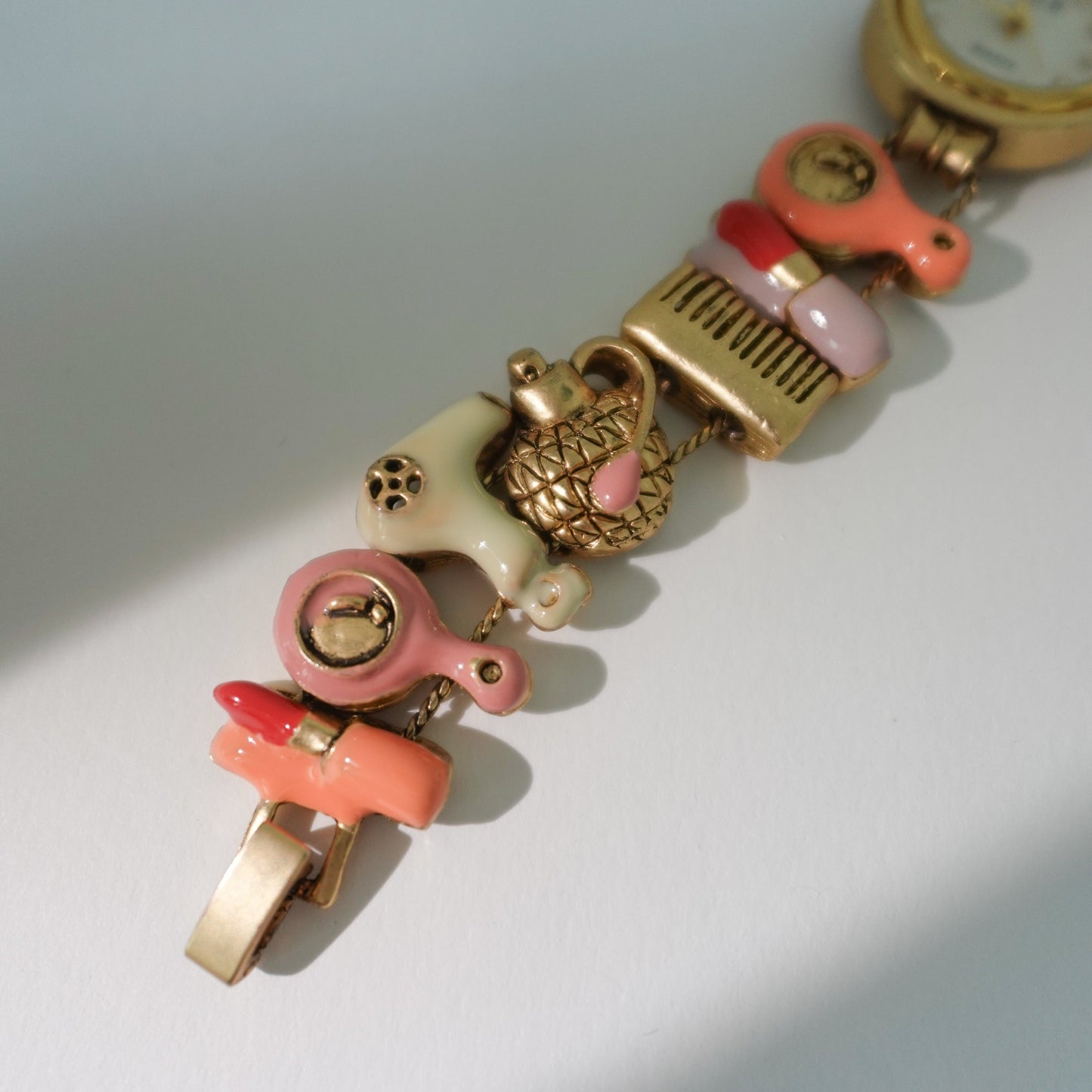 Gold beauty charms watch