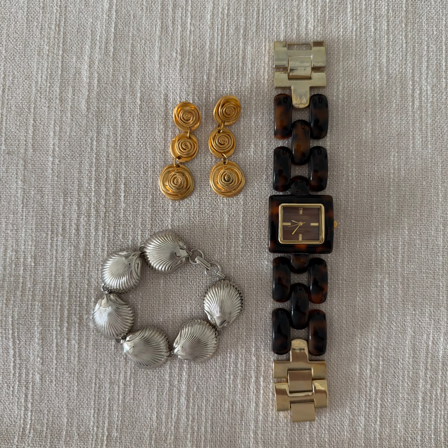 Gold-tone swirl dangle earrings with watch and bracelet