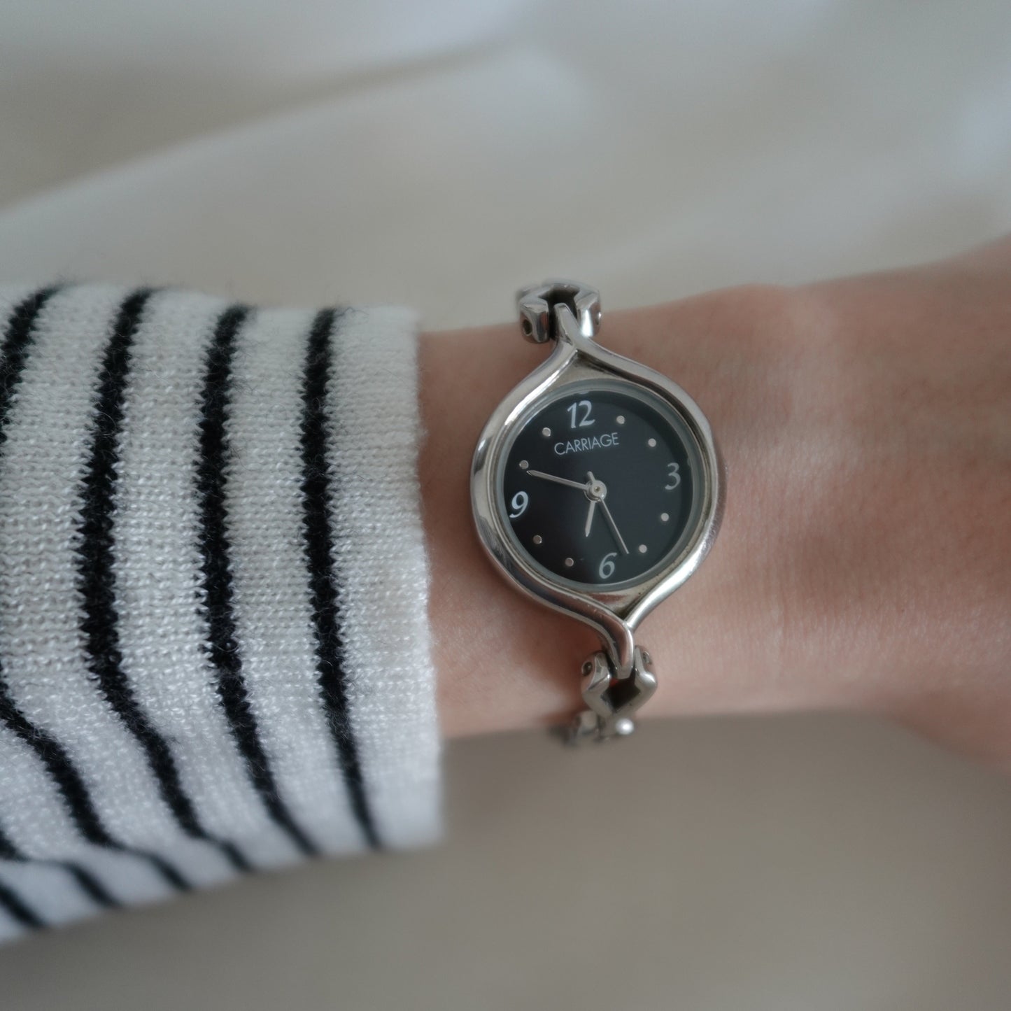 Silver tone dainty watch