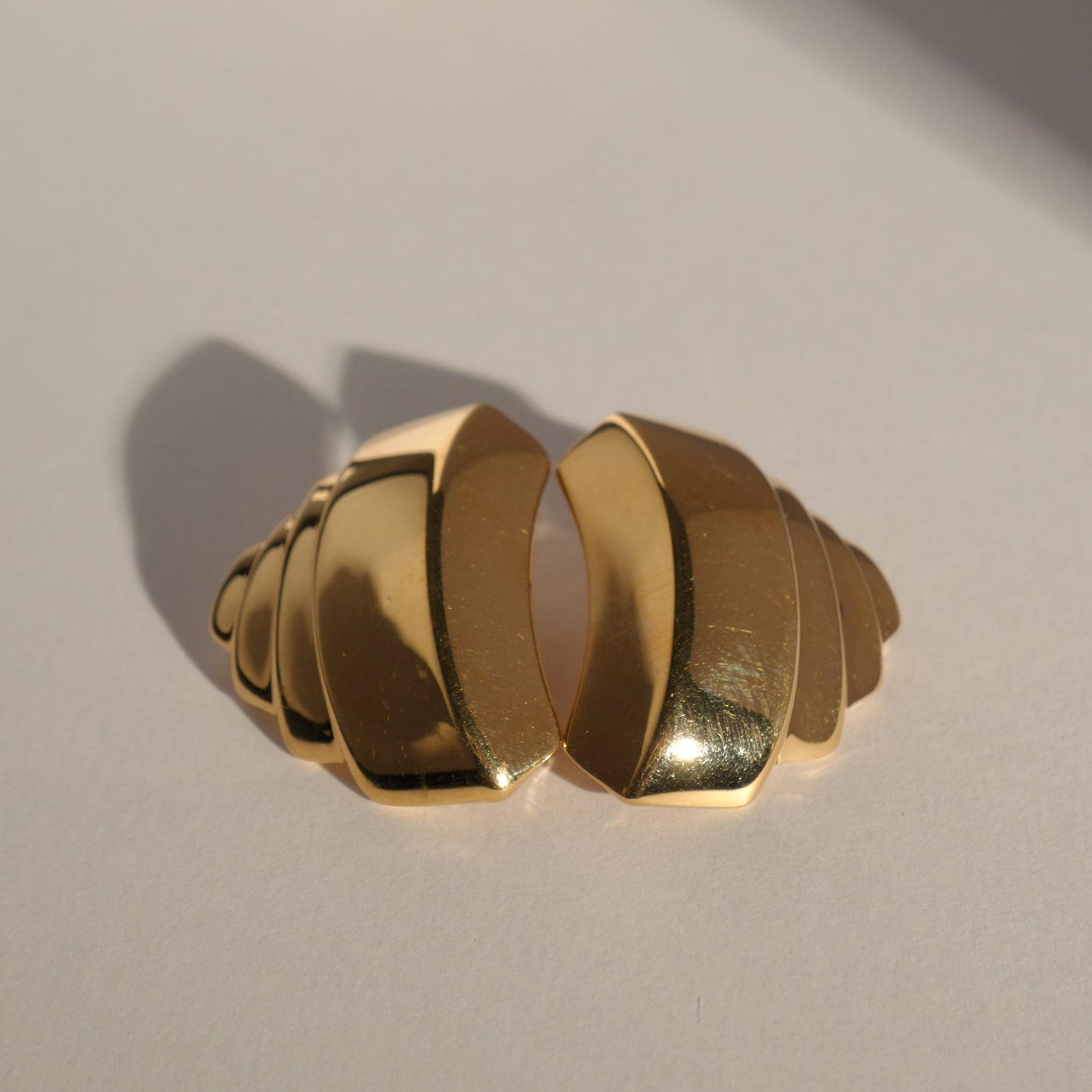 1980s croissant shape gold plated earrings, Monet