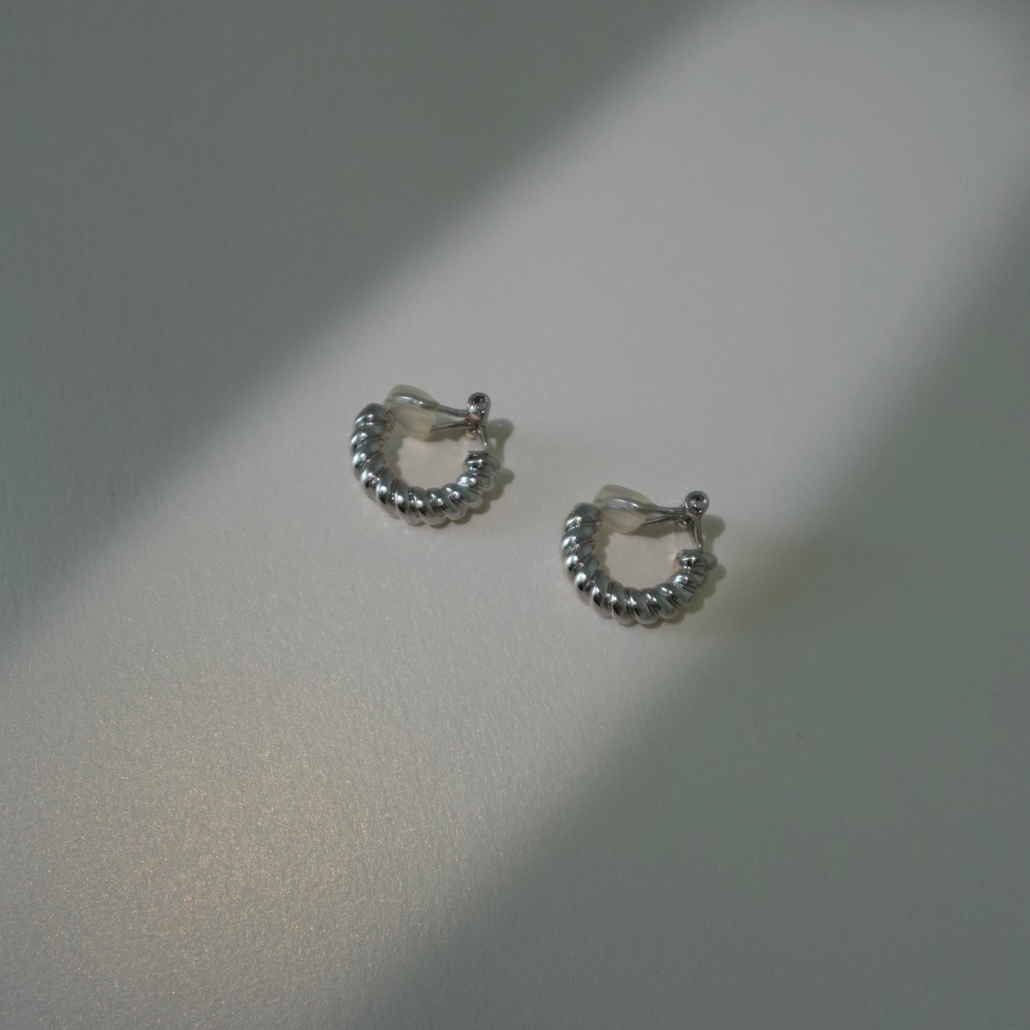 Silver twist hoops