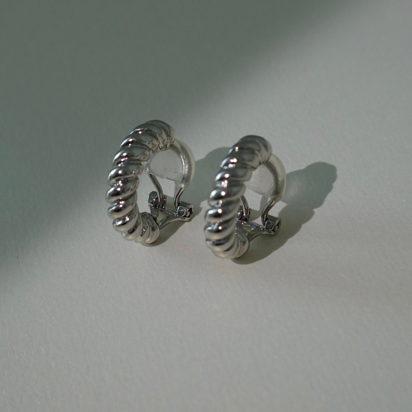 Silver twist hoops