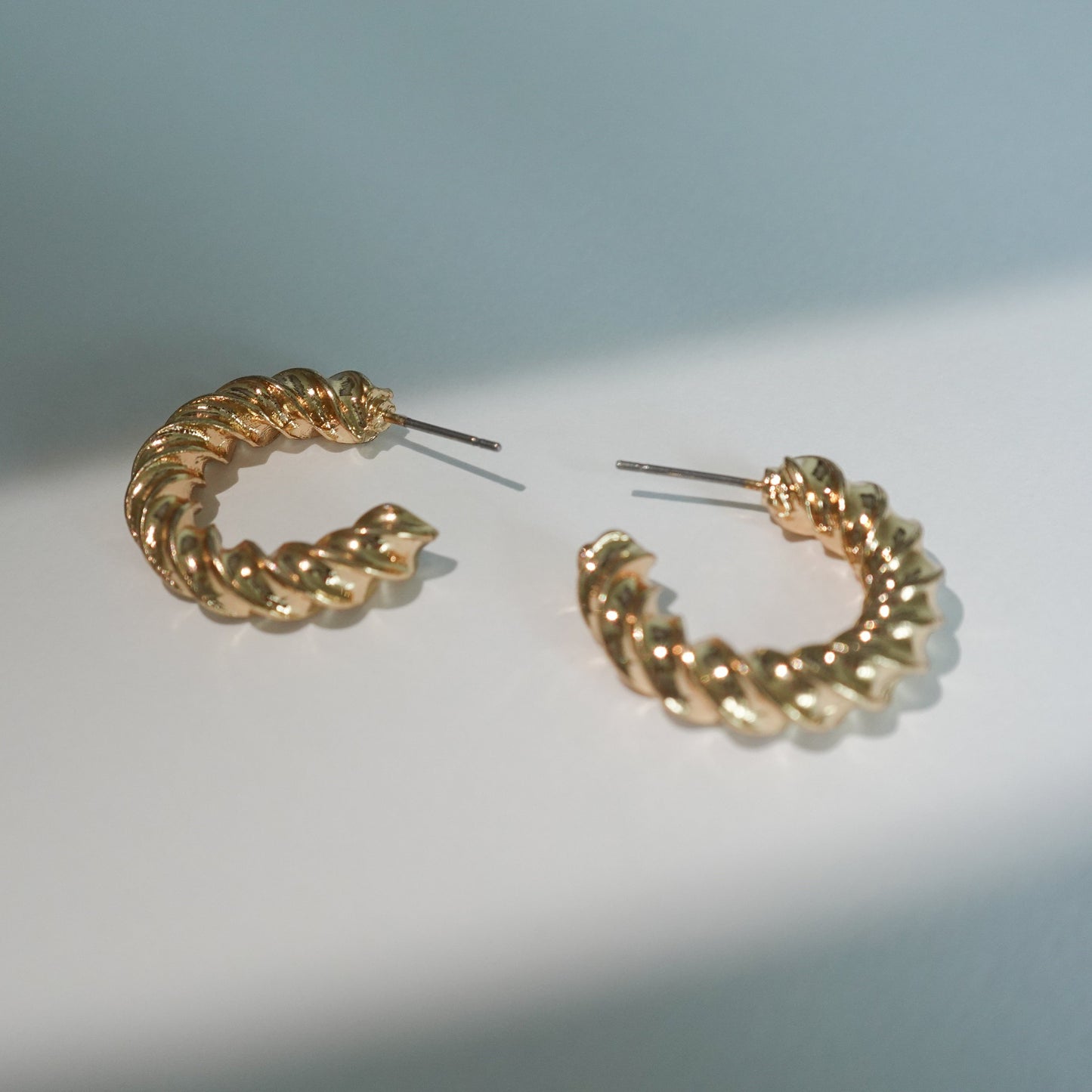 Swirl gold hoops