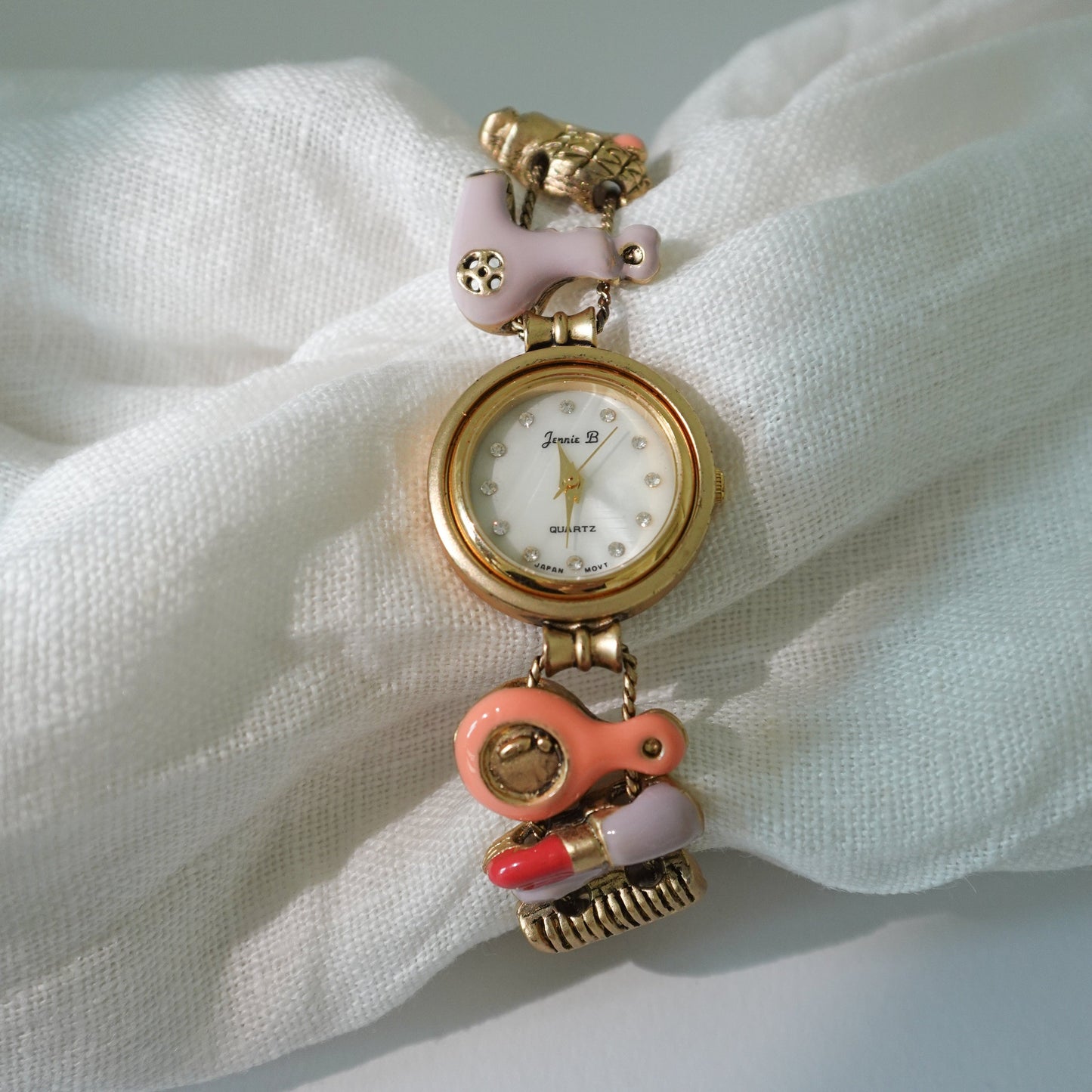 Gold beauty charms watch