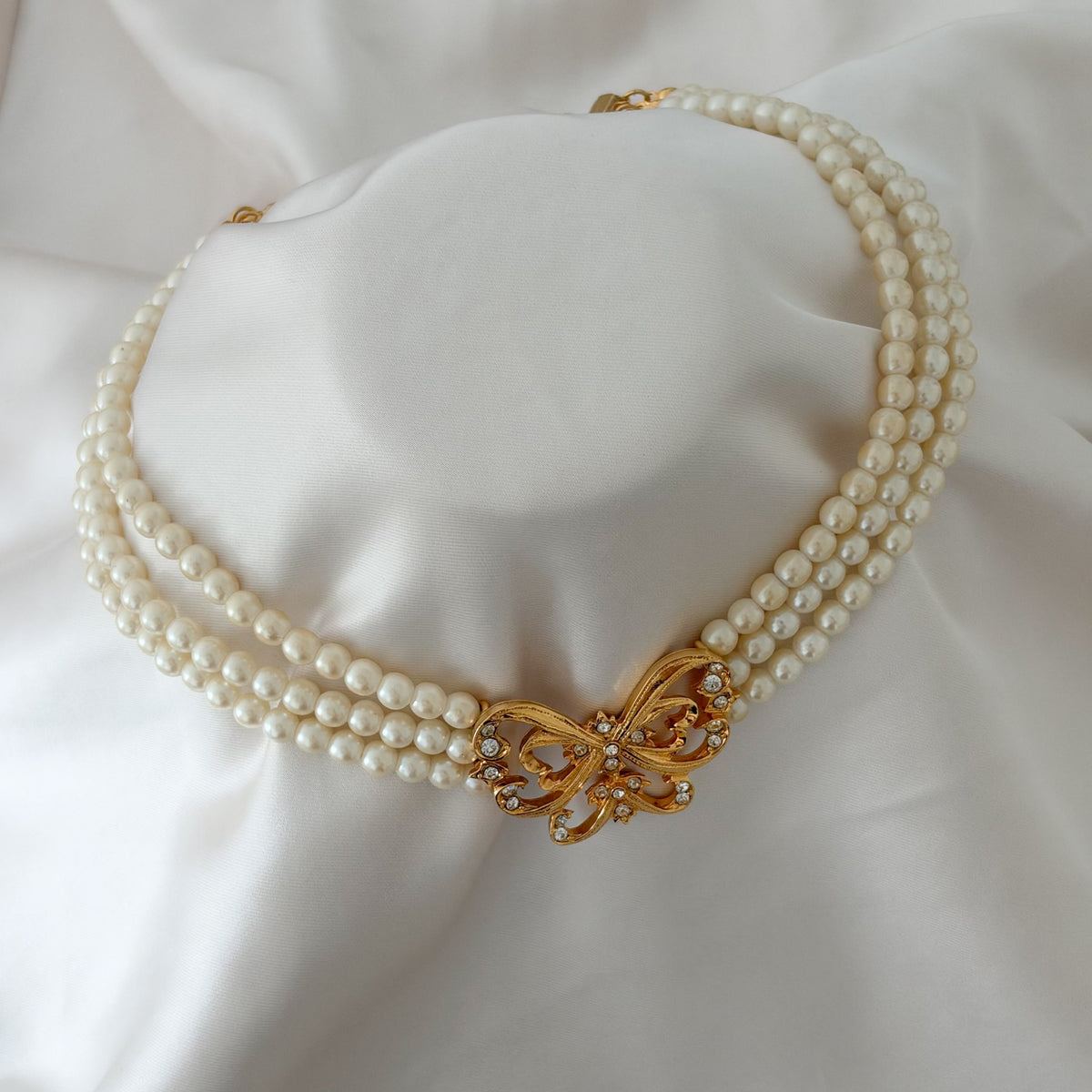 Vintage Parisian butterfly faux pearl necklace