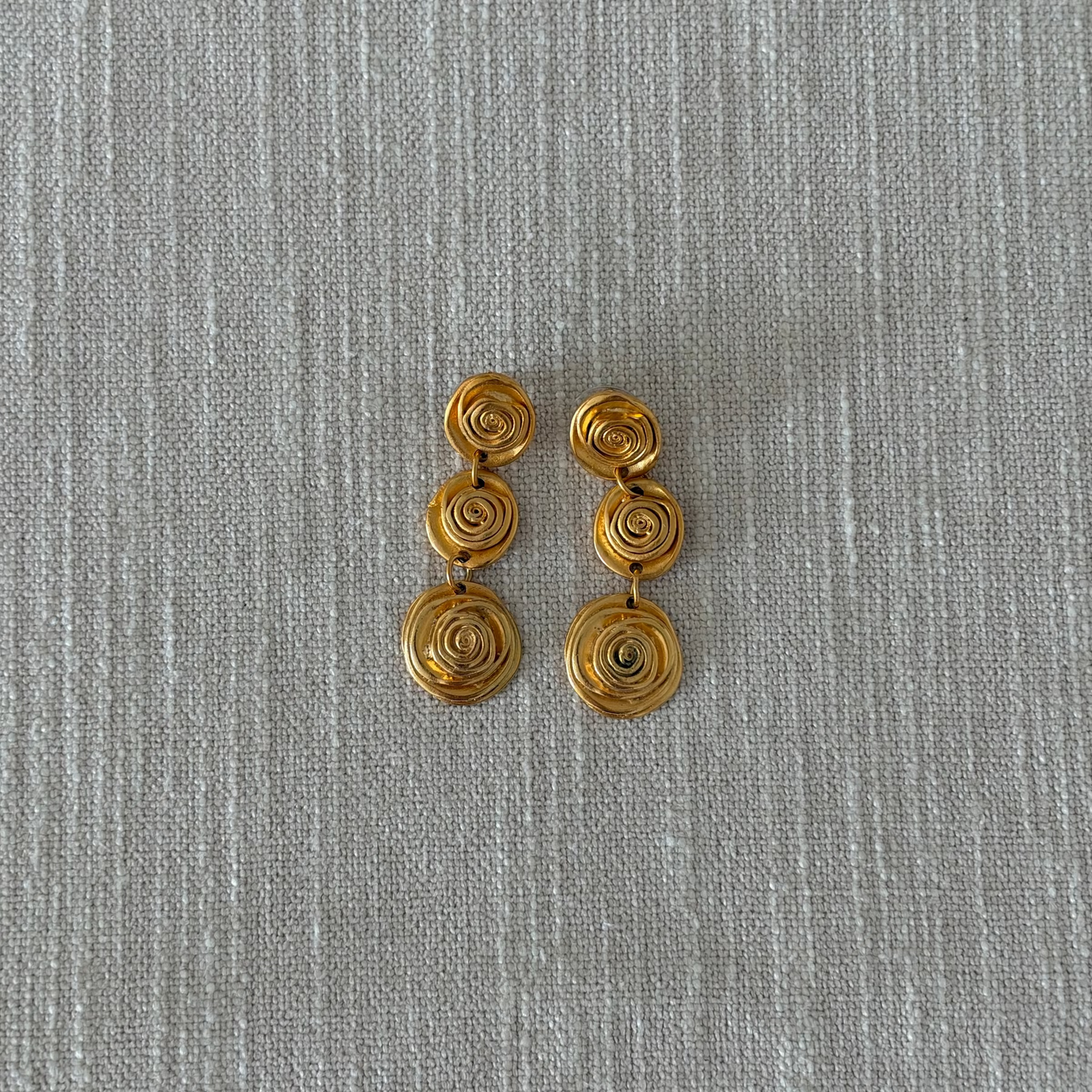 Gold-tone swirl dangle earrings