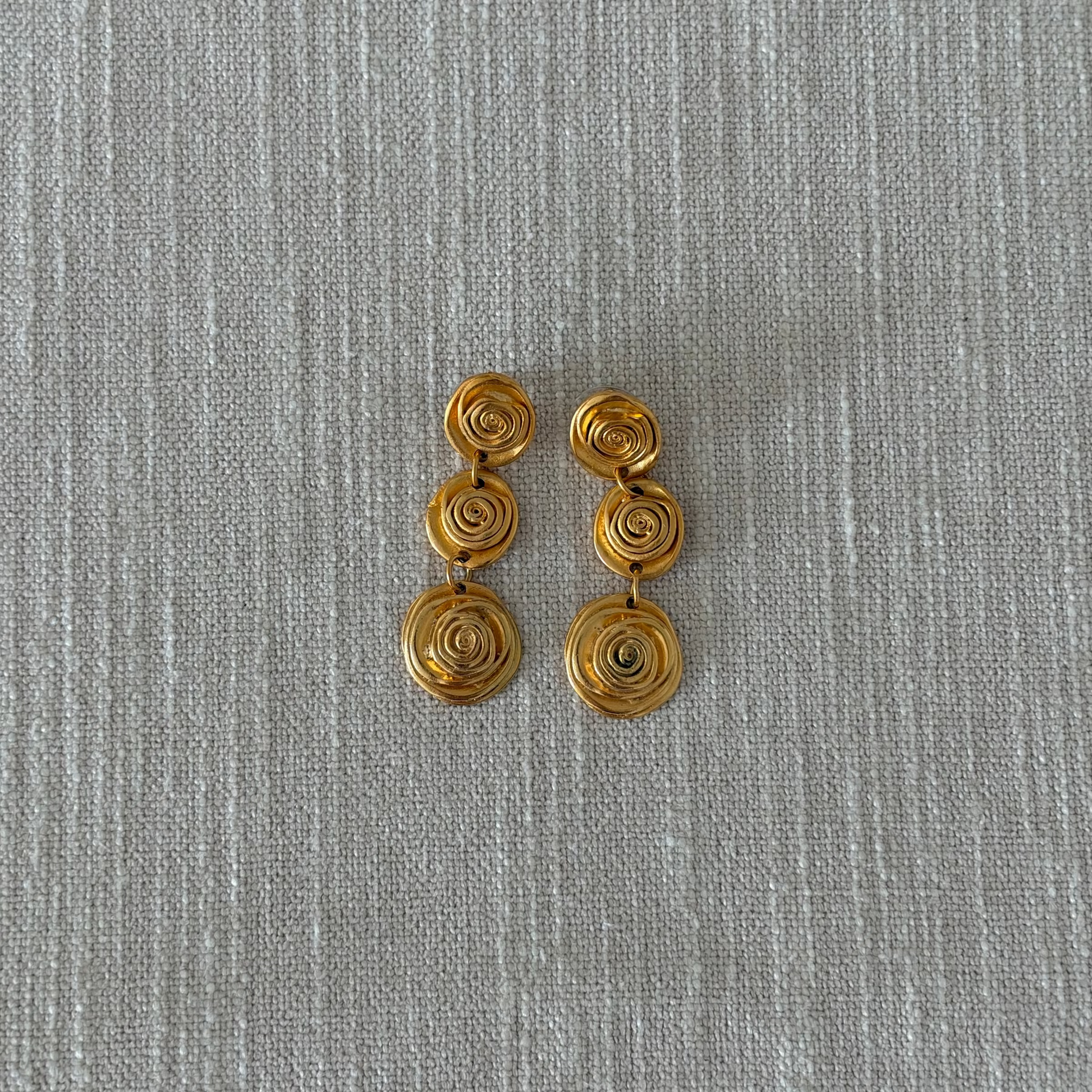 Gold-tone swirl dangle earrings