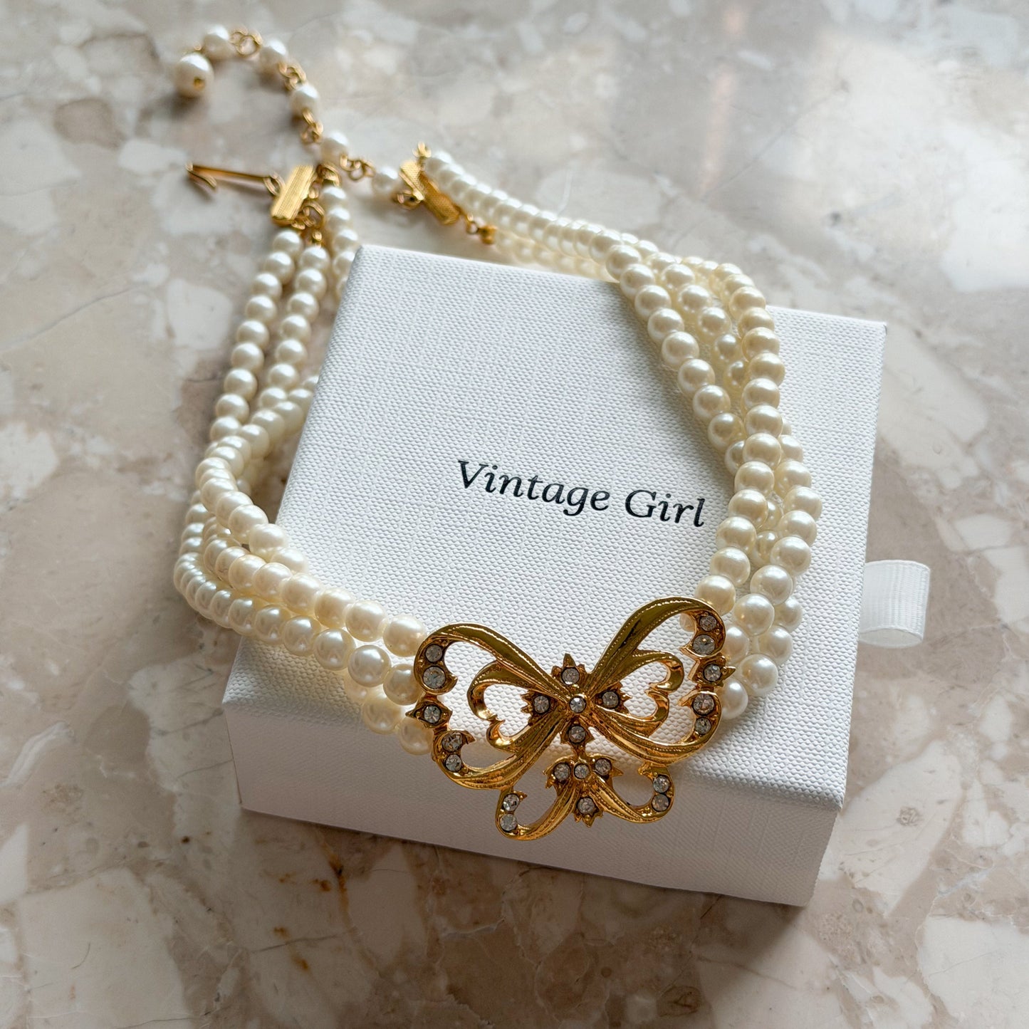 Vintage Parisian butterfly faux pearl necklace